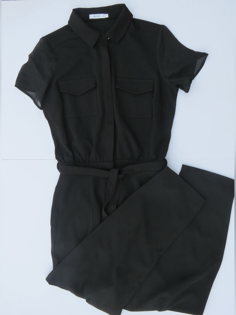Ricki’s Black Short Sleeve Jumpsuit with Belt